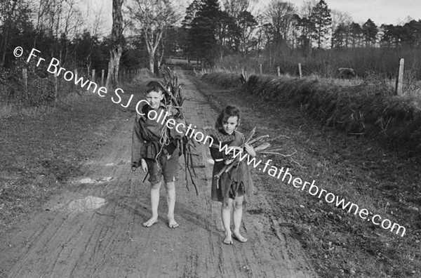 TOMMY & ELIZABETH MCEVOY AS BEGGARS FOR FOXFORD FILM